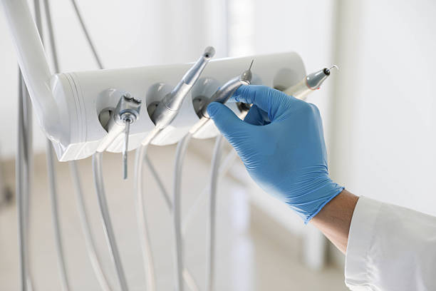 Professional Tooth Extraction technician working in Hartshorne, OK
